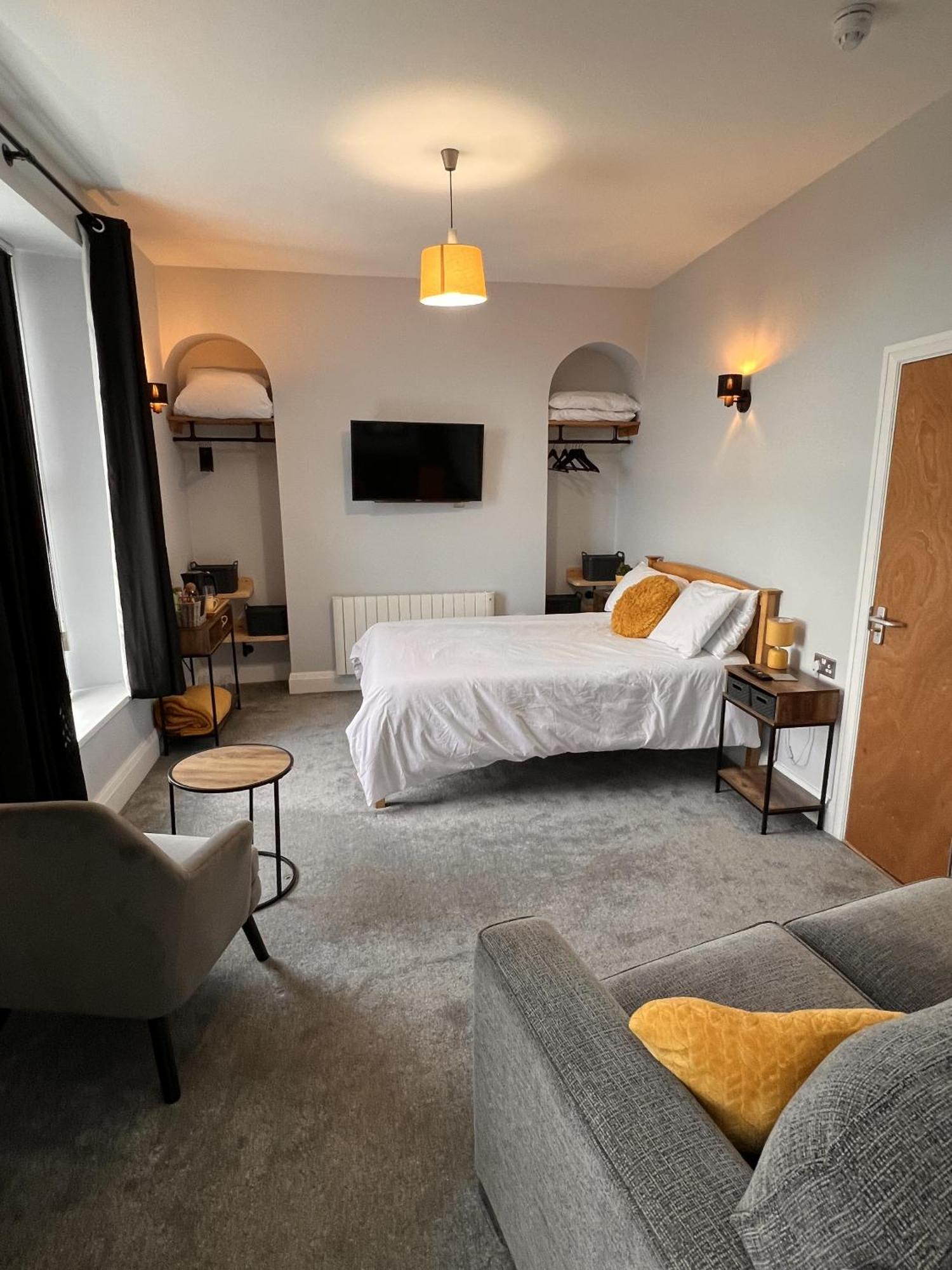 Hoopers Sandy Beach Guest Rooms Суонзи Стая снимка