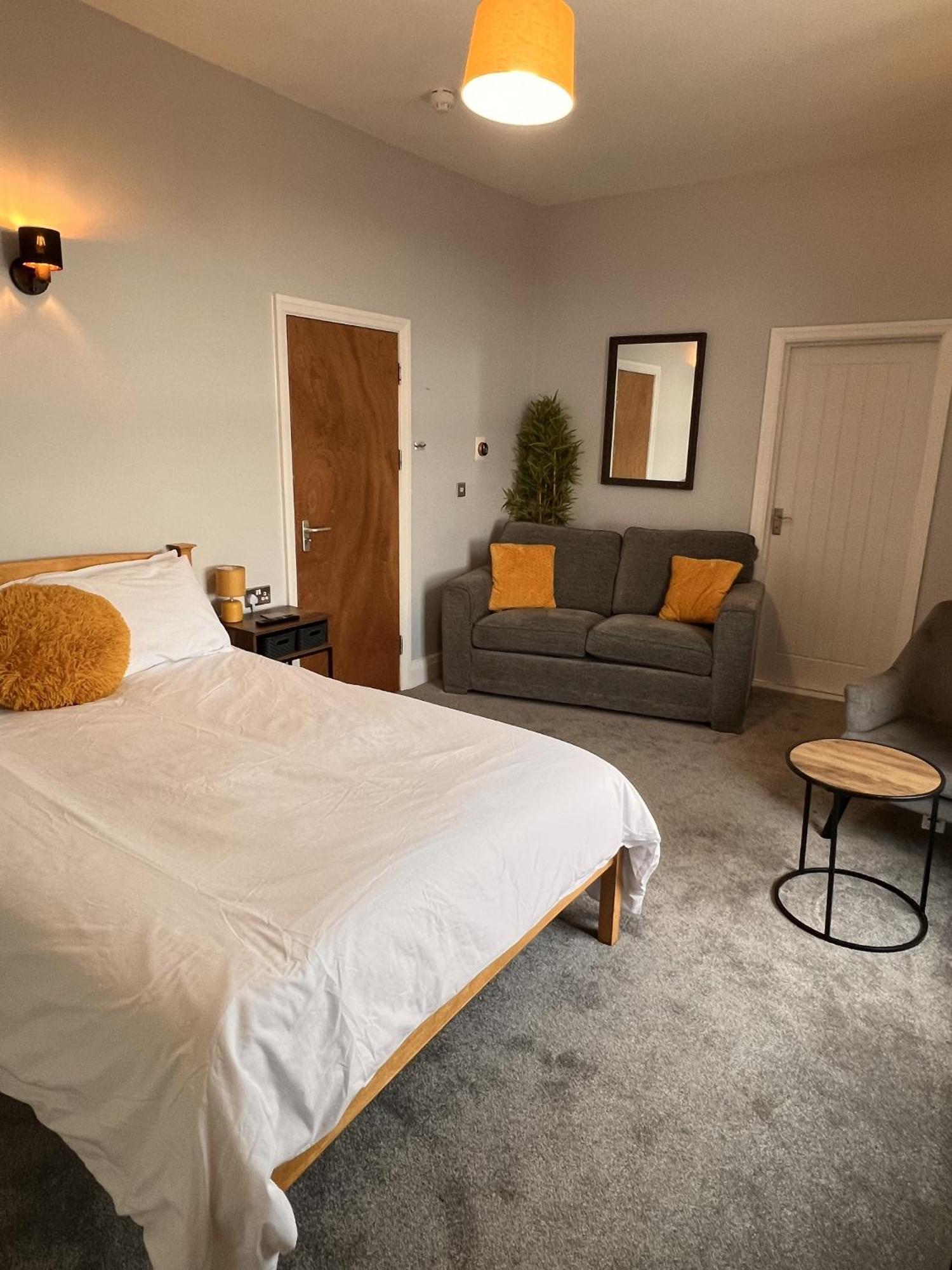 Hoopers Sandy Beach Guest Rooms Суонзи Стая снимка