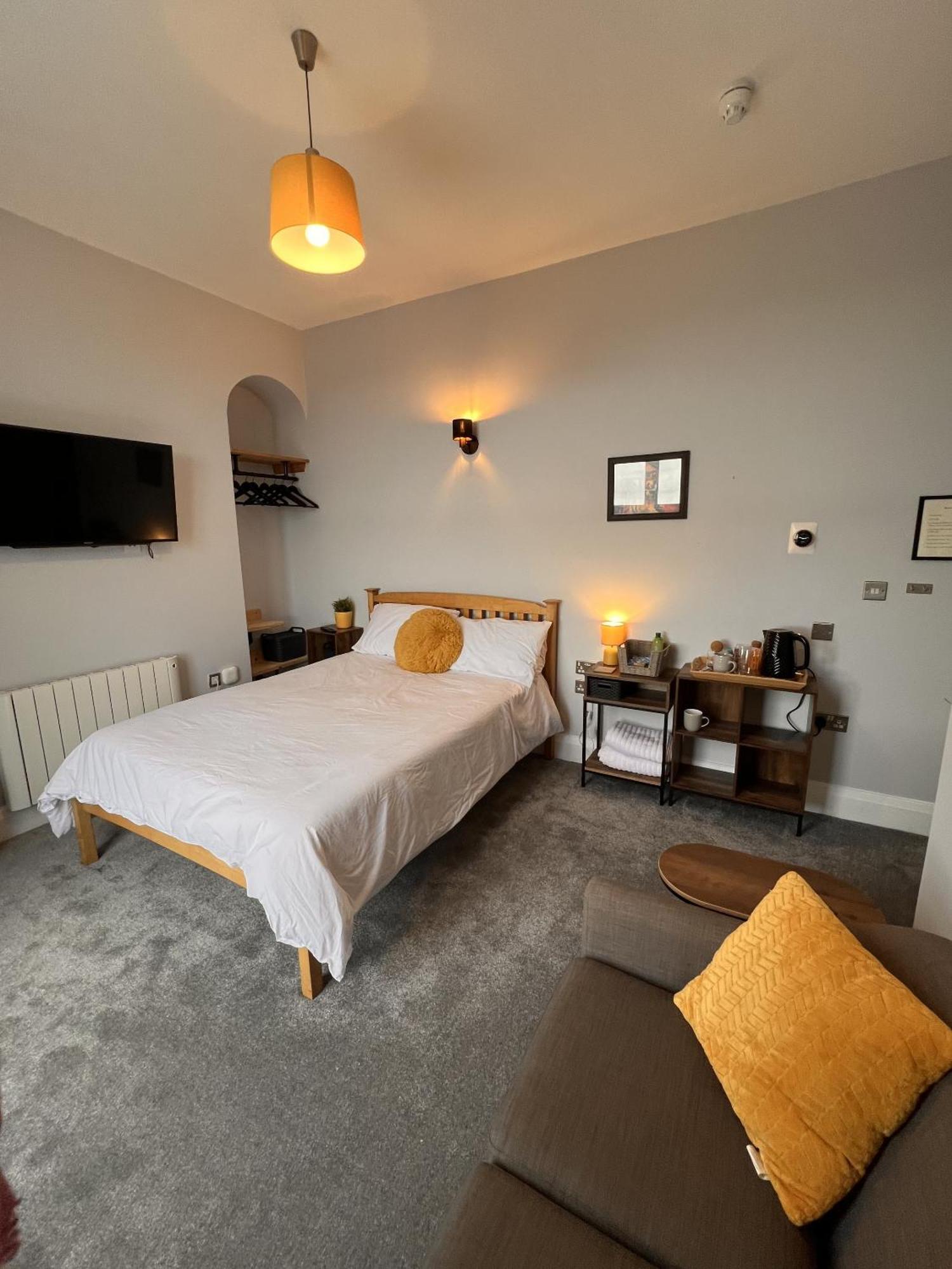 Hoopers Sandy Beach Guest Rooms Суонзи Стая снимка